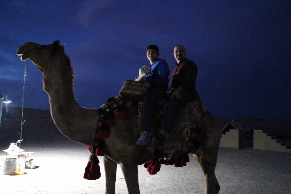 Camel riding in Yazd desert